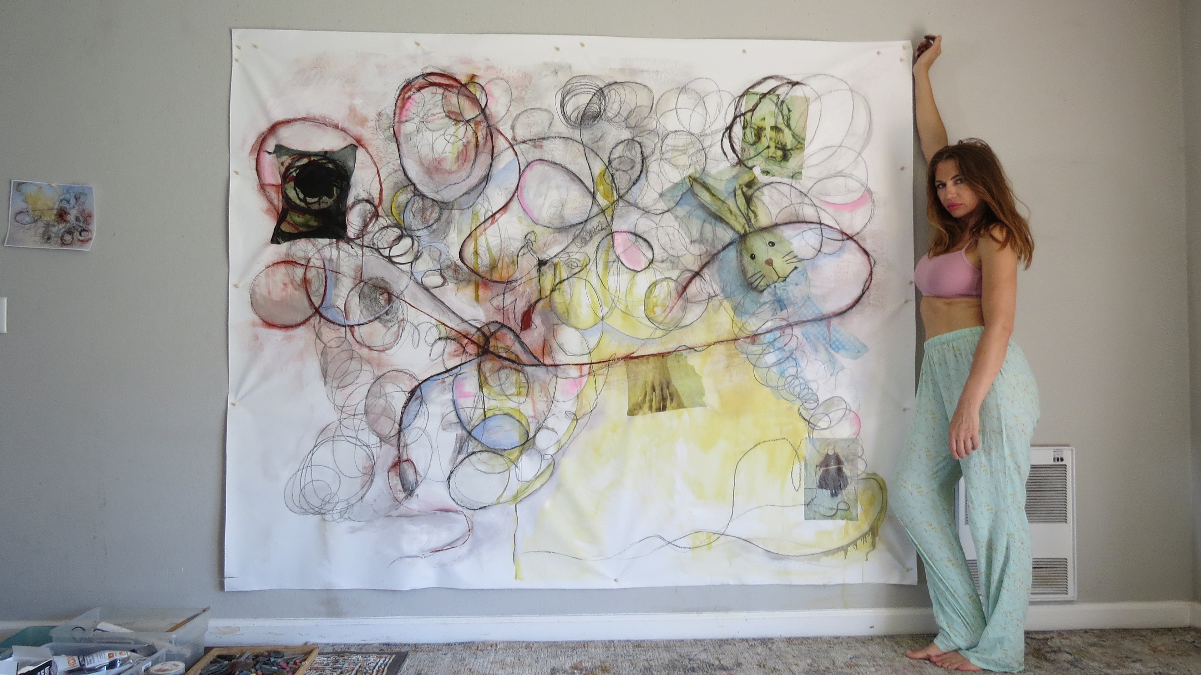 Marina Orlova displaying large-scale abstract mixed media artwork