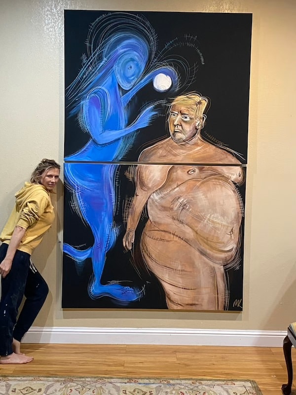 Marina Orlova viewing large figurative artwork in studio