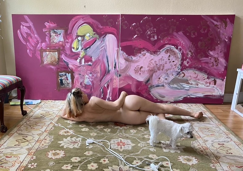 Marina Orlova in studio with large-scale mixed media work